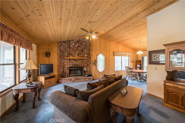 living room with a brick fireplace, ceiling fan, lofted ceiling, and wooden ceiling