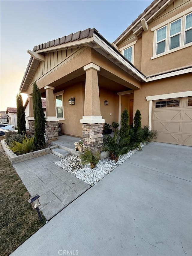 exterior space with a garage