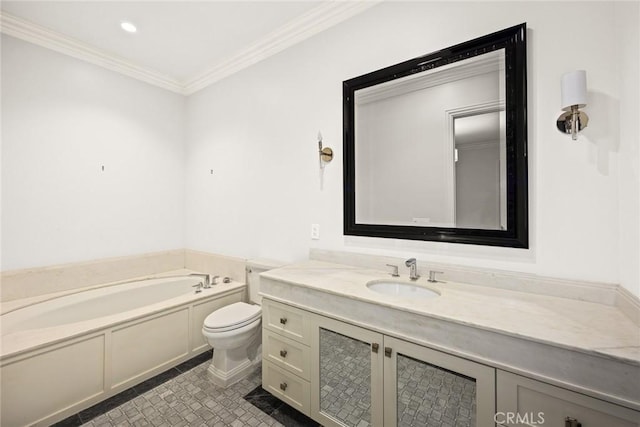 bathroom featuring tile patterned floors, crown molding, toilet, a bathtub, and vanity