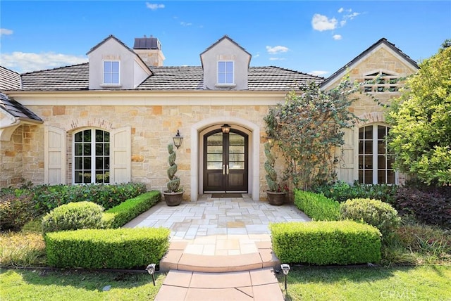 entrance to property with french doors