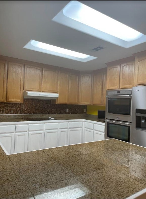 kitchen with appliances with stainless steel finishes