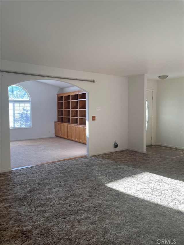 spare room featuring carpet flooring