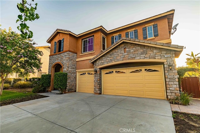 view of front of property with a garage