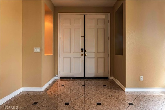 entrance foyer with baseboards