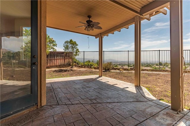 view of patio / terrace with a fenced backyard and a ceiling fan