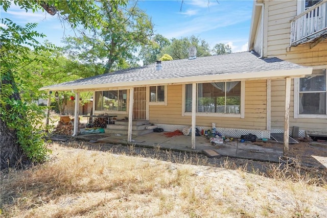 rear view of house featuring a patio area