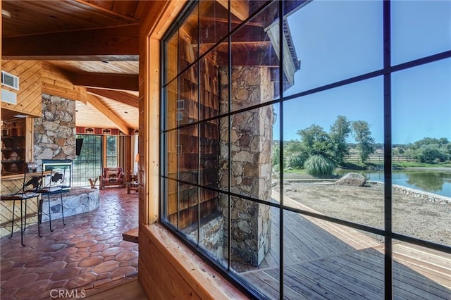 hall with beam ceiling, a water view, wood ceiling, and dark wood-type flooring