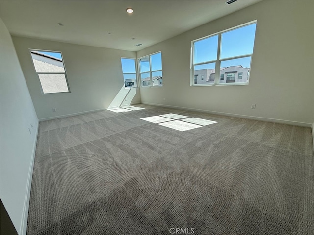 4811 Swallowtail Ln, Fontana, CA 92336 - spare room featuring baseboards, light colored carpet, and recessed lighting
