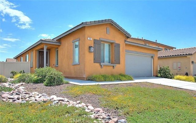 view of side of property featuring a garage