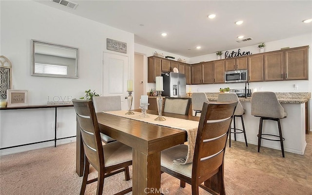 view of carpeted dining room