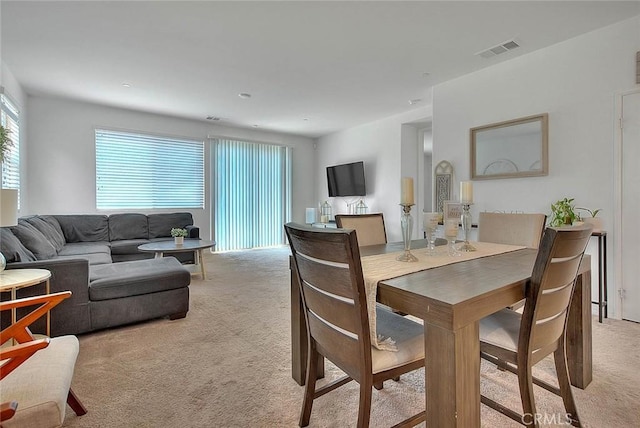 view of carpeted dining room