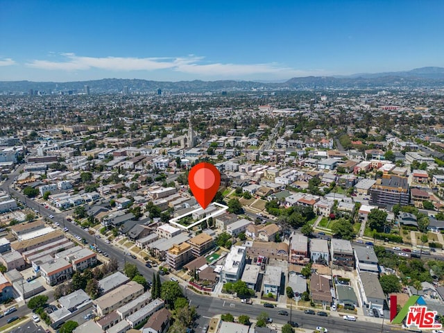 drone / aerial view featuring a mountain view