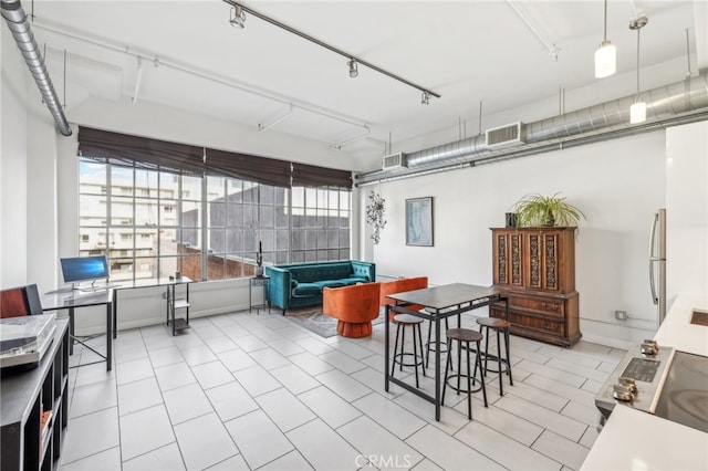 interior space featuring light tile patterned floors