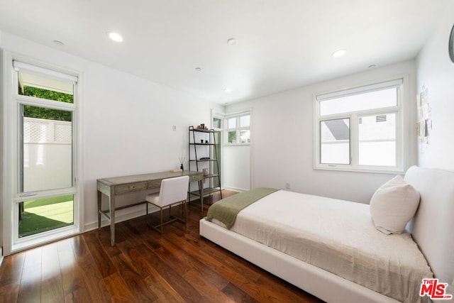 bedroom featuring dark hardwood / wood-style floors