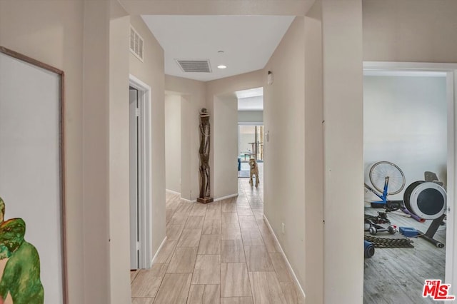 hall featuring light hardwood / wood-style flooring