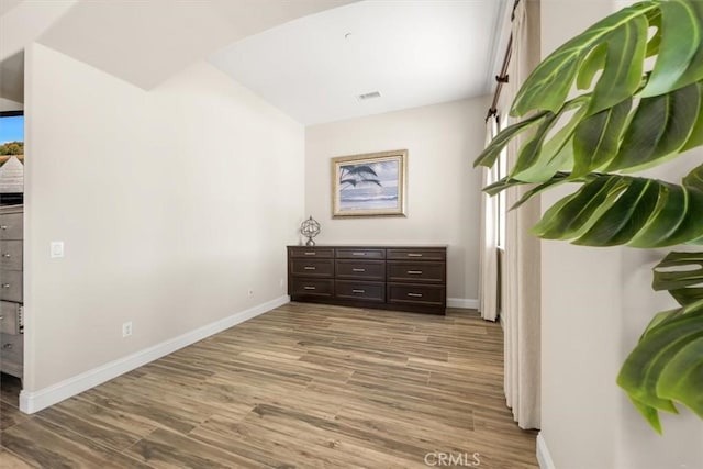 hallway featuring light wood-type flooring