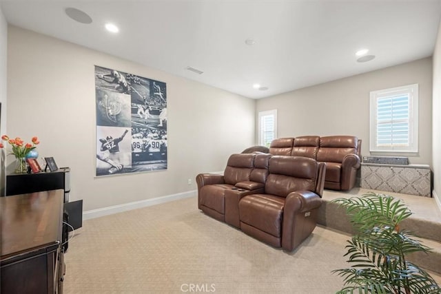 home theater with light carpet and a wealth of natural light