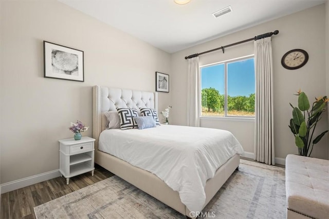 bedroom featuring hardwood / wood-style flooring