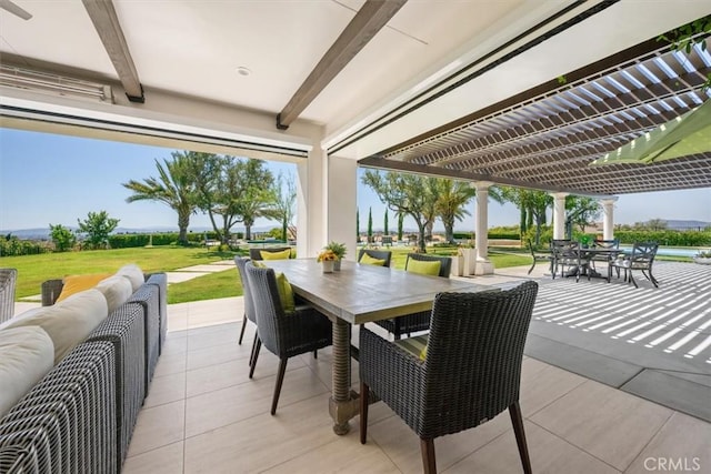 view of patio / terrace with an outdoor hangout area and a pergola