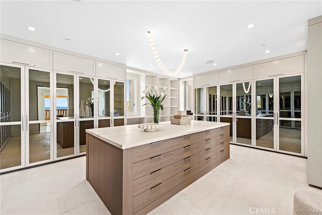 walk in closet with french doors