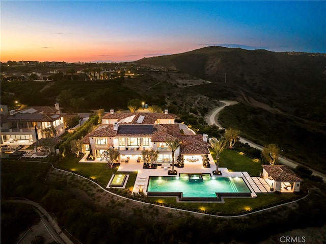 view of aerial view at dusk