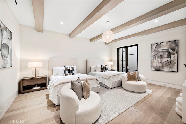 bedroom featuring beamed ceiling, recessed lighting, french doors, light wood finished floors, and baseboards