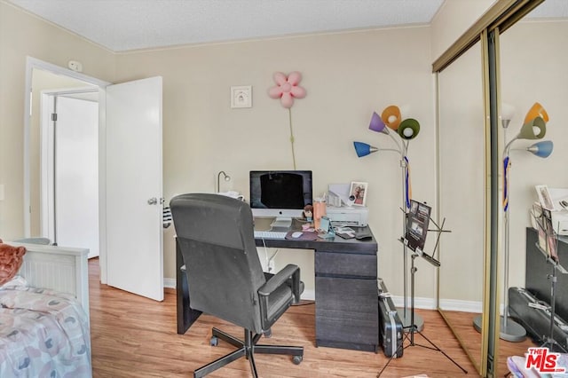 office area featuring light wood-type flooring