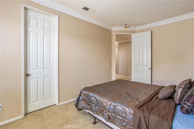 bedroom with light colored carpet and crown molding