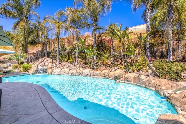 view of pool featuring pool water feature