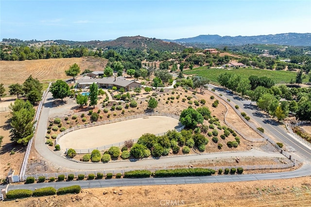 aerial view with a mountain view and a rural view