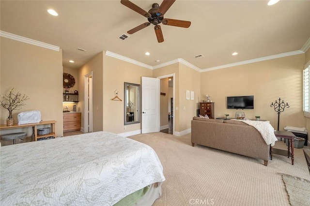 carpeted bedroom featuring ceiling fan and crown molding