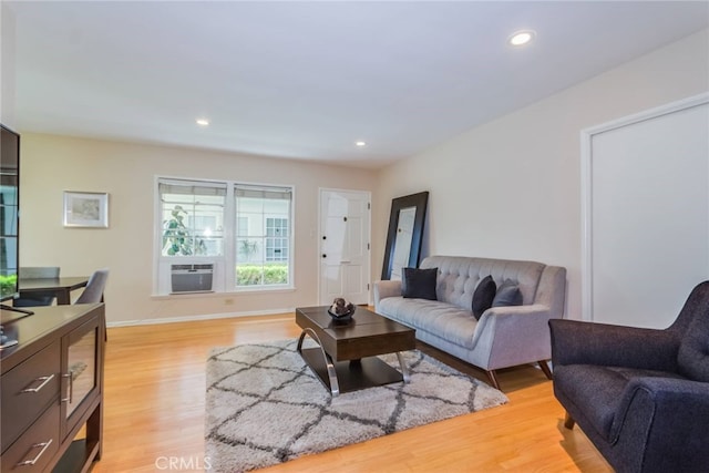 living room with light hardwood / wood-style floors