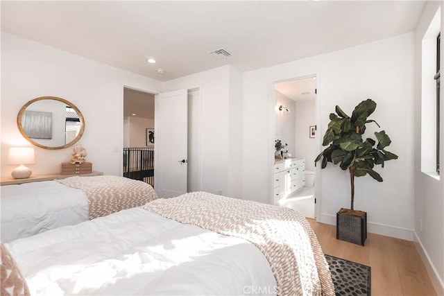 bedroom featuring light hardwood / wood-style flooring