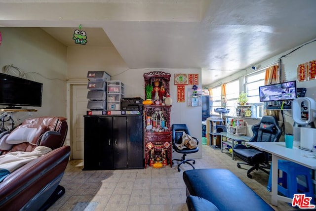 office with light tile patterned flooring