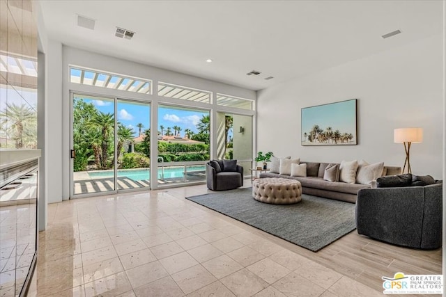 living room with plenty of natural light