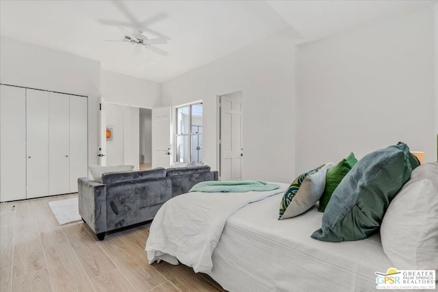 bedroom featuring light hardwood / wood-style floors and ceiling fan