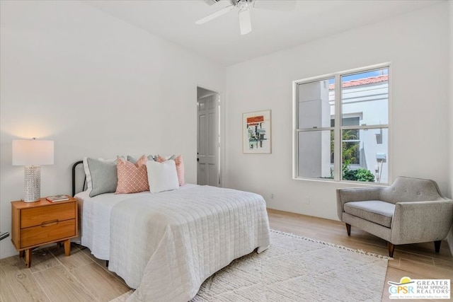 bedroom featuring ceiling fan and light wood-type flooring