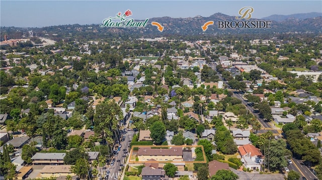 birds eye view of property featuring a mountain view