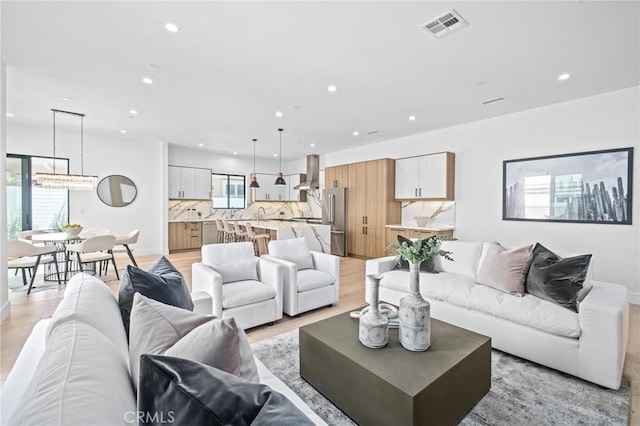 living room with light wood-type flooring