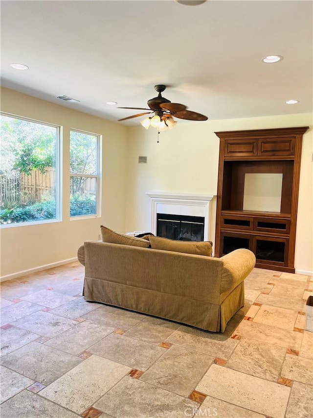 living room with ceiling fan