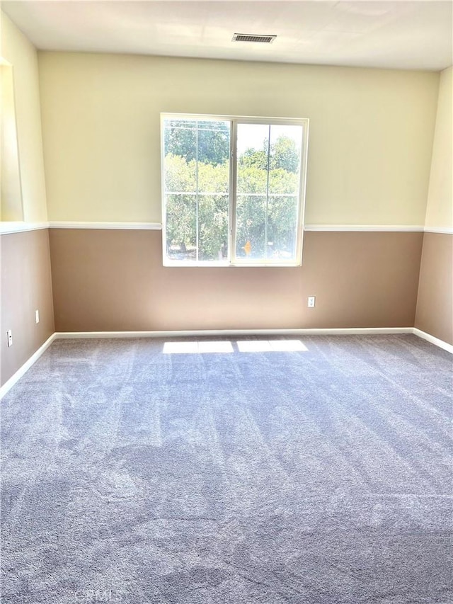 empty room featuring carpet