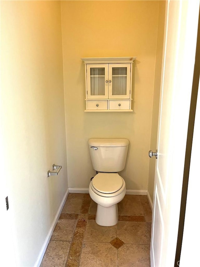 bathroom featuring toilet