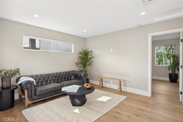 living room featuring light wood-type flooring