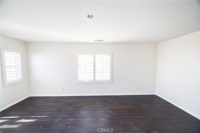 empty room featuring hardwood / wood-style flooring