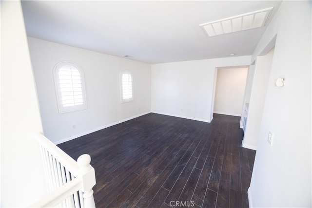 unfurnished room featuring wood-type flooring