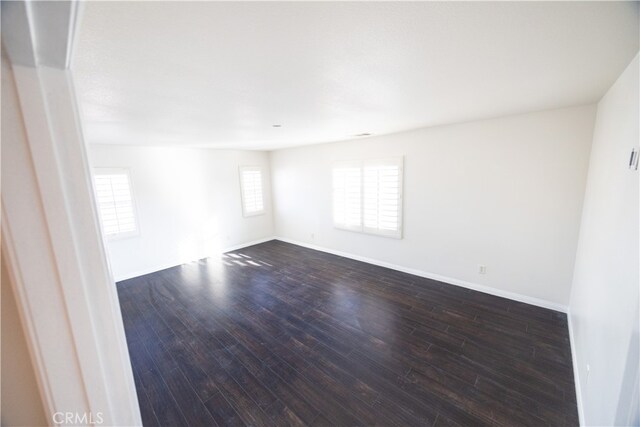 empty room featuring hardwood / wood-style floors