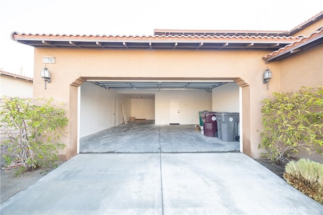 garage featuring a carport