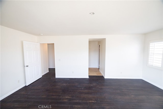 empty room with wood-type flooring