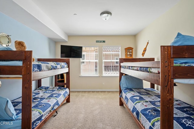 bedroom featuring carpet