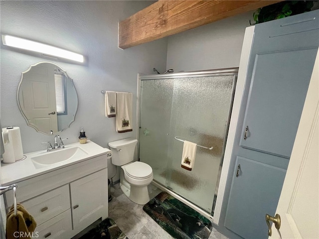 bathroom with walk in shower, tile patterned floors, toilet, and vanity